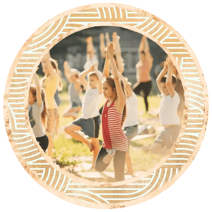 kids at a festival doing a yoga workshop
