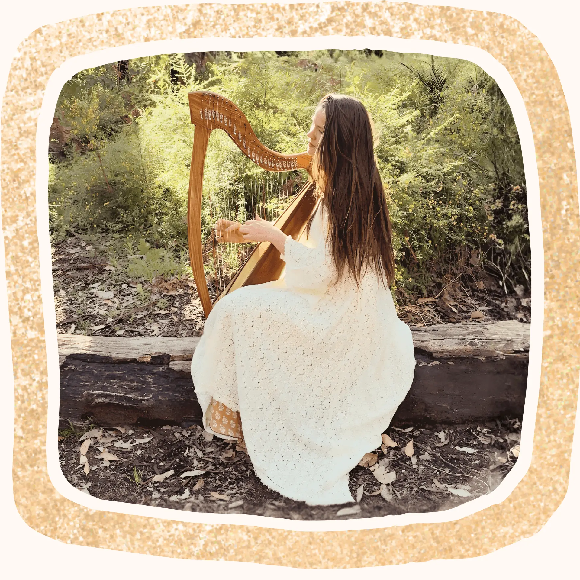 Charmaine Playiing harp and singing in nature